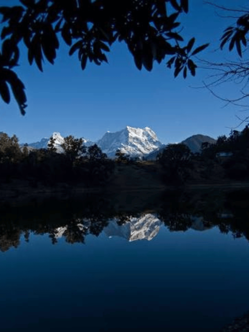Deoria Tal lake surrounded by forest